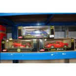 Three boxed diecast model vehicles