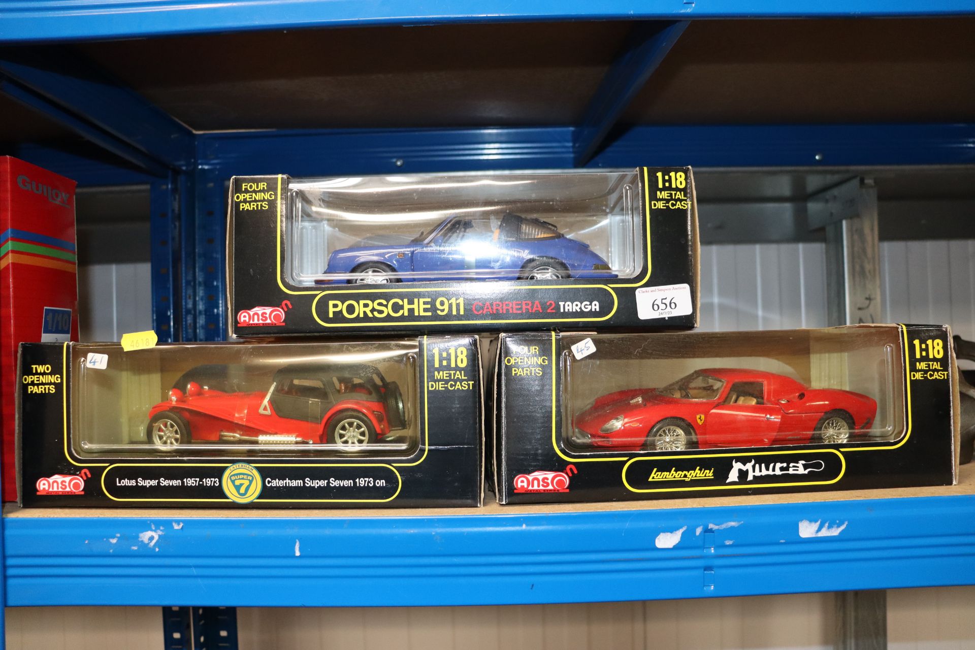 Three boxed diecast model vehicles