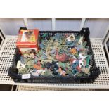 A box of toy soldiers and animals