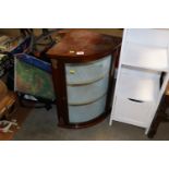 A mahogany and glazed bow front corner display cab