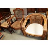 A carved wooden and cane back tub chair, a cane seated and backed elbow chair AF