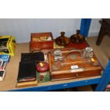 A pair of olive wood candlesticks, a box of wooden