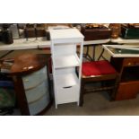 A modern shelf unit fitted single drawer below