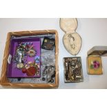 A box of various costume jewellery