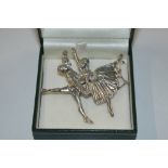 A white metal ballerina brooch, approx. 12.5gms