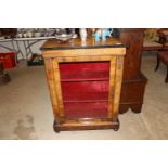 A 19th Century walnut and inlaid pier cabinet