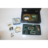 A jewellery box and contents containing bangles, b