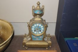 A 19th Century French gilded mantel clock having S