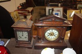 A late Victorian two hole mantel clock with column