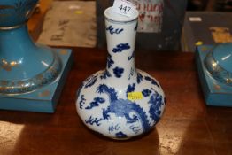 A Chinese blue and white dragon vase