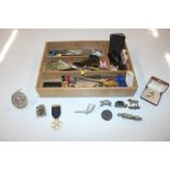 A wooden tray and contents including pen knives, c