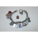 A Sterling silver watch chain, charm bracelet, and