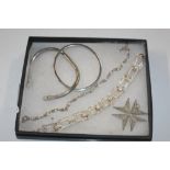 A box of five silver and white metal bracelets, ap