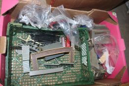 A box of model railway items, die-cast vehicles et