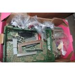 A box of model railway items, die-cast vehicles et