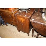 An oak record cabinet