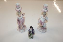 A pair of 19th Century German porcelain figural ca
