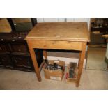 A stripped pine clerks desk