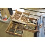 Two boxes containing various sized nails and a further box of various fixtures and fittings