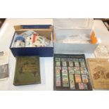 Two boxes containing a stamp album; various loose