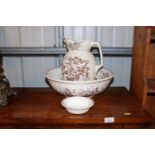 A Victorian toilet jug and basin and a soap dish l