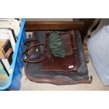 A man's travel suit bag; and other leather bags