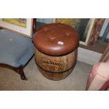 A reproduction Jack Daniels barrel seat