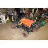 A Westwood T1100 ride-on lawn mower