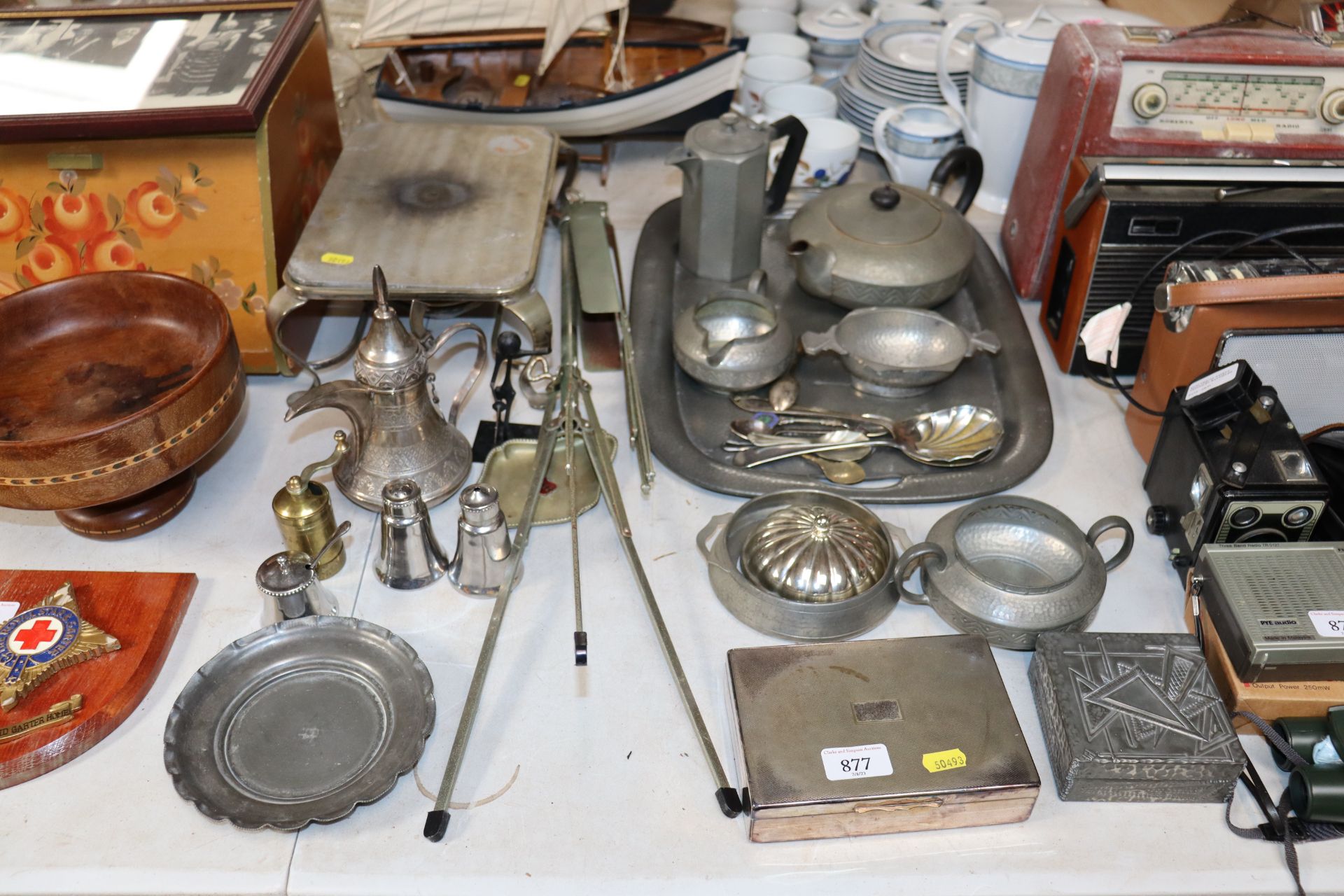 A collection of metal ware to include music stand, pewter tea ware, cigarette box etc