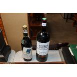 A bottle of Smith Havt Lafitte wine and a bottle o