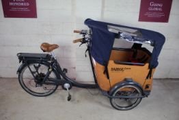 ** UPDATED DESCRIPTION ** An electric Babboe Curve-E cargo bike, fitted with rain tent, with Shimano