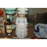 A continental porcelain china doll ornament