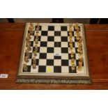 A chess board and chess pieces