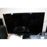 A Panasonic flat screen television and a Panasonic