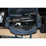 A Panasonic camcorder with carrying case and vario