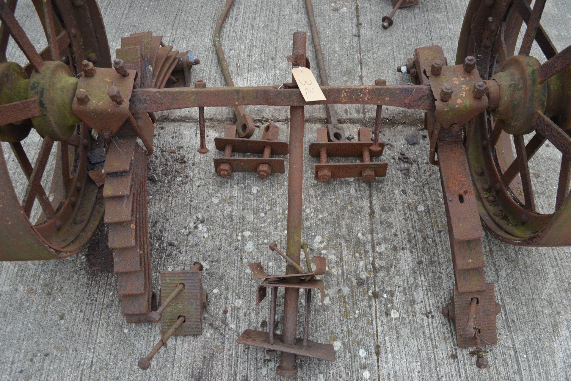 Set of four matching cast iron Foster of Lincoln steam traction wagon wheels. With axles and leaf - Image 3 of 4