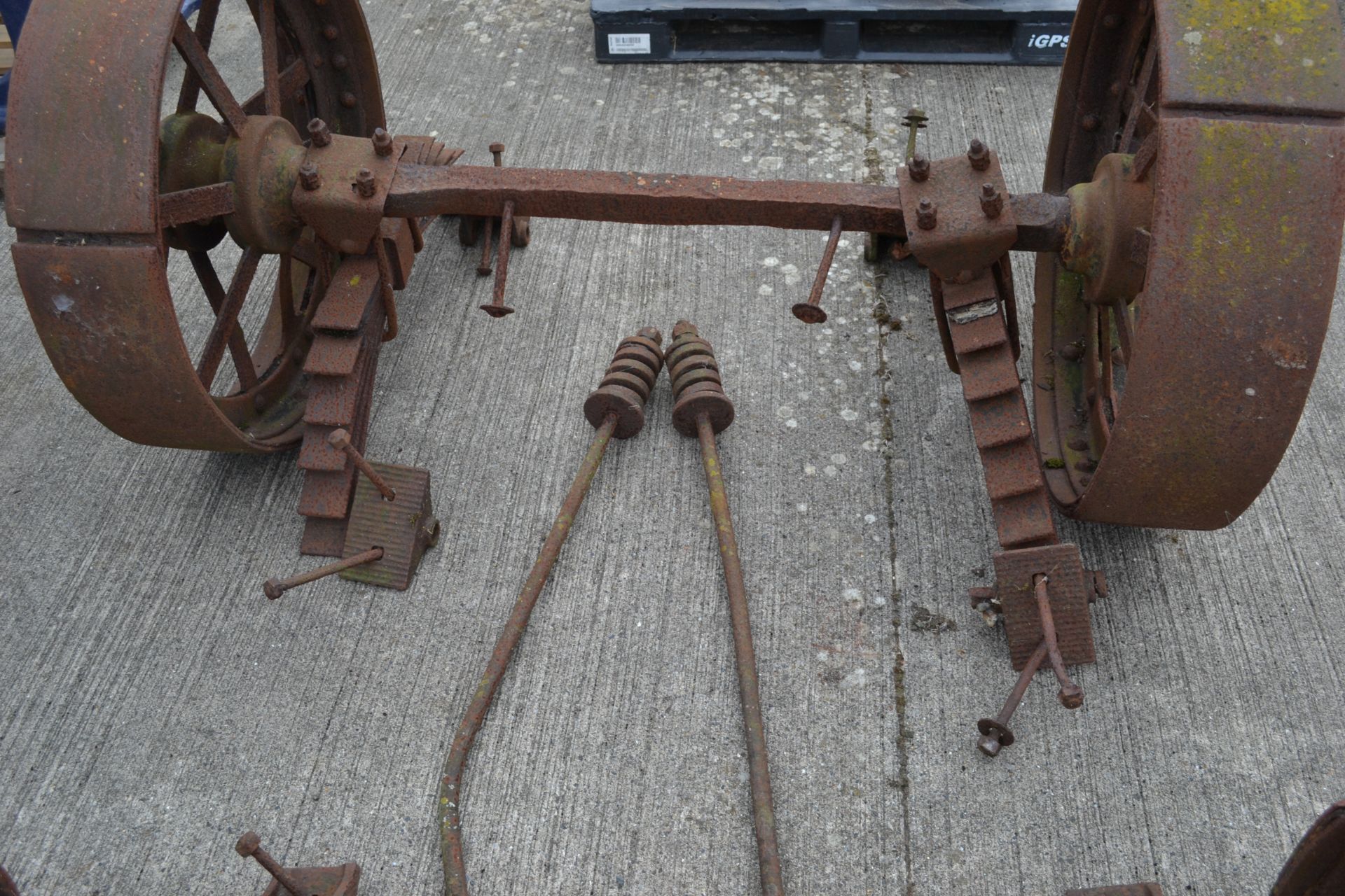 Set of four matching cast iron Foster of Lincoln steam traction wagon wheels. With axles and leaf - Image 4 of 4