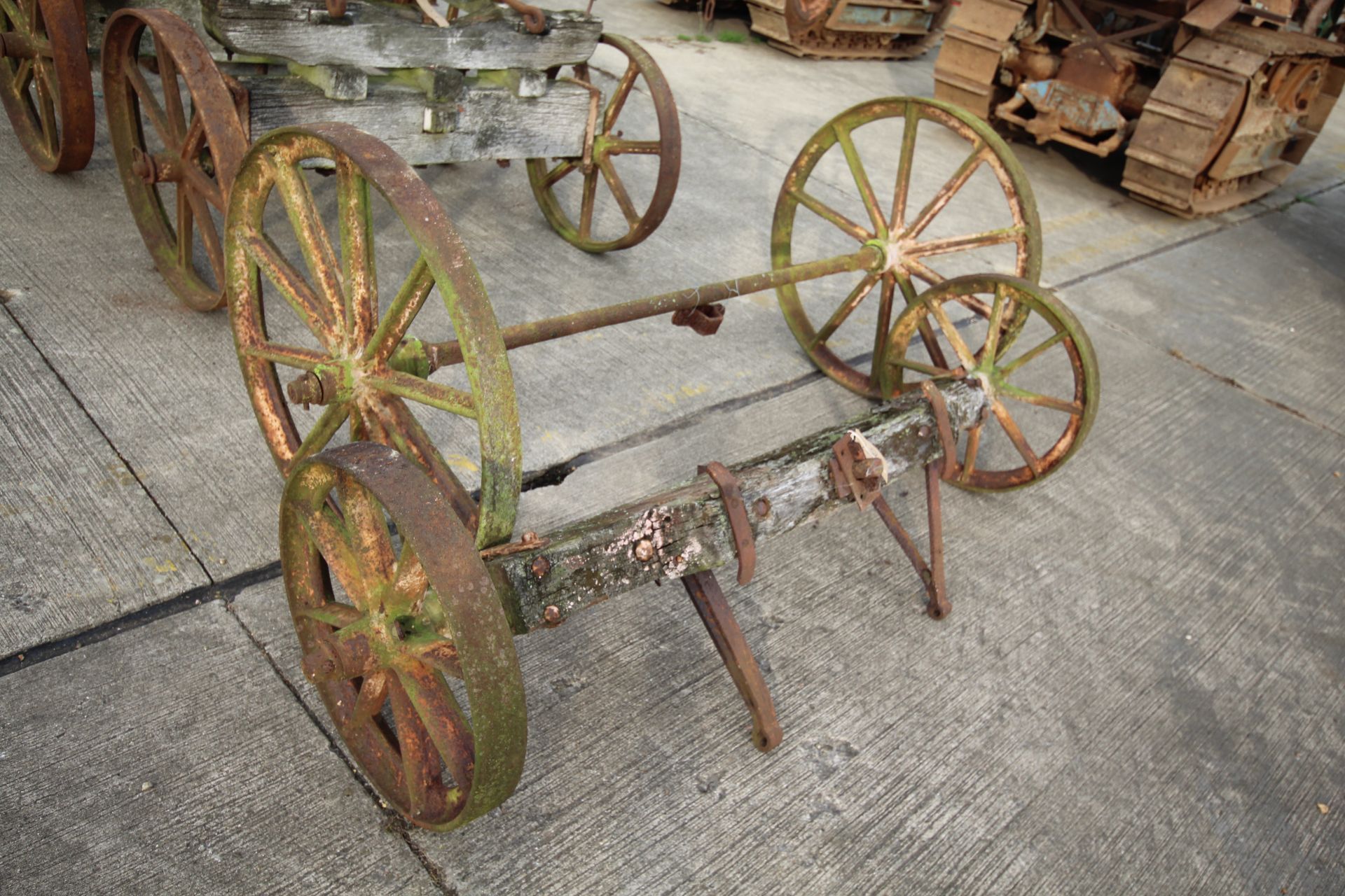 Set of four matching cast wheels on axles. Suit shepherds hut.