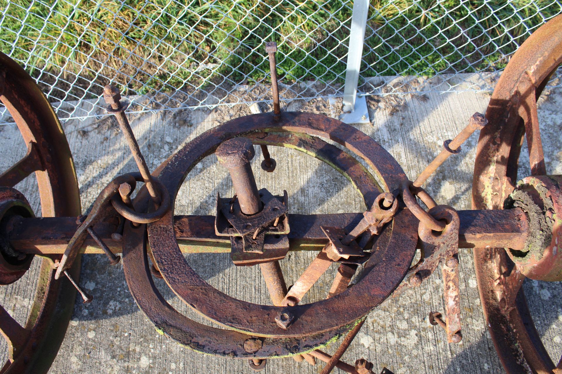 ** LOT WITHDRAWN ** Pair of cast iron wheels on axle with turntable. Ex-straw pitcher. - Image 7 of 7