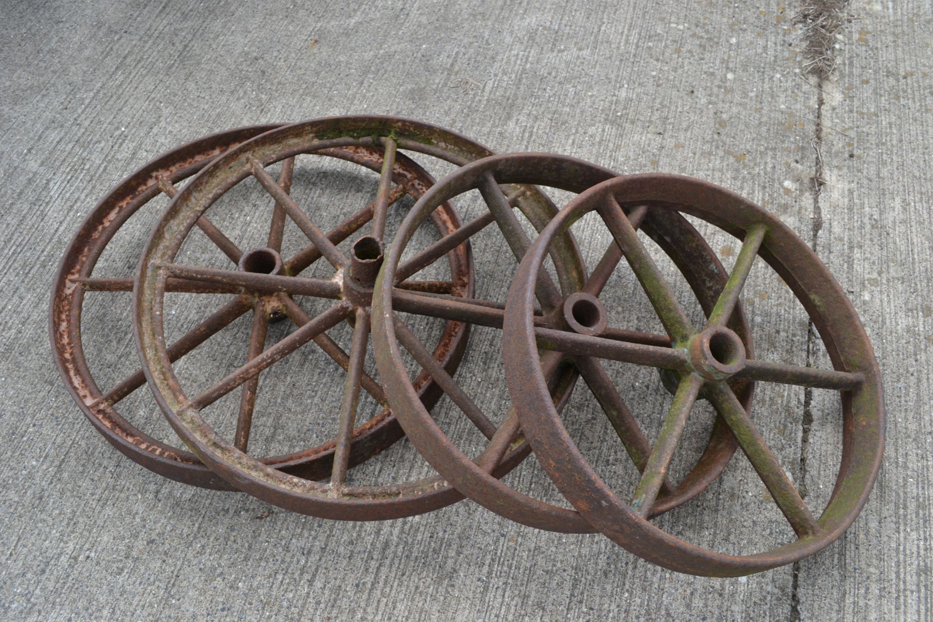 Matching set of 4x cast iron wheels.