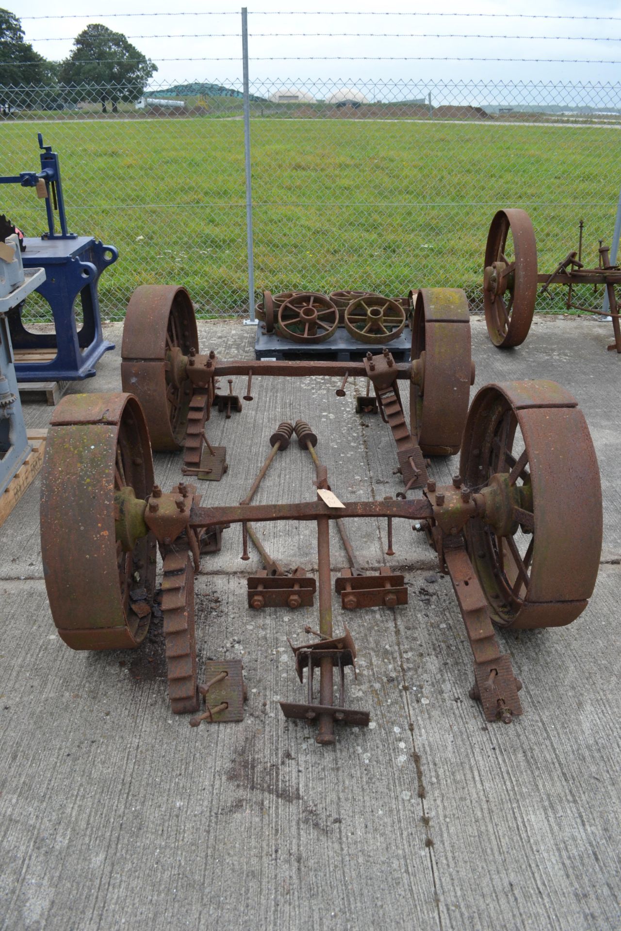 Set of four matching cast iron Foster of Lincoln steam traction wagon wheels. With axles and leaf - Image 2 of 4