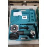 Makita grinder (in box).