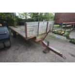 Pettit 13ft single axle flat bed trailer.