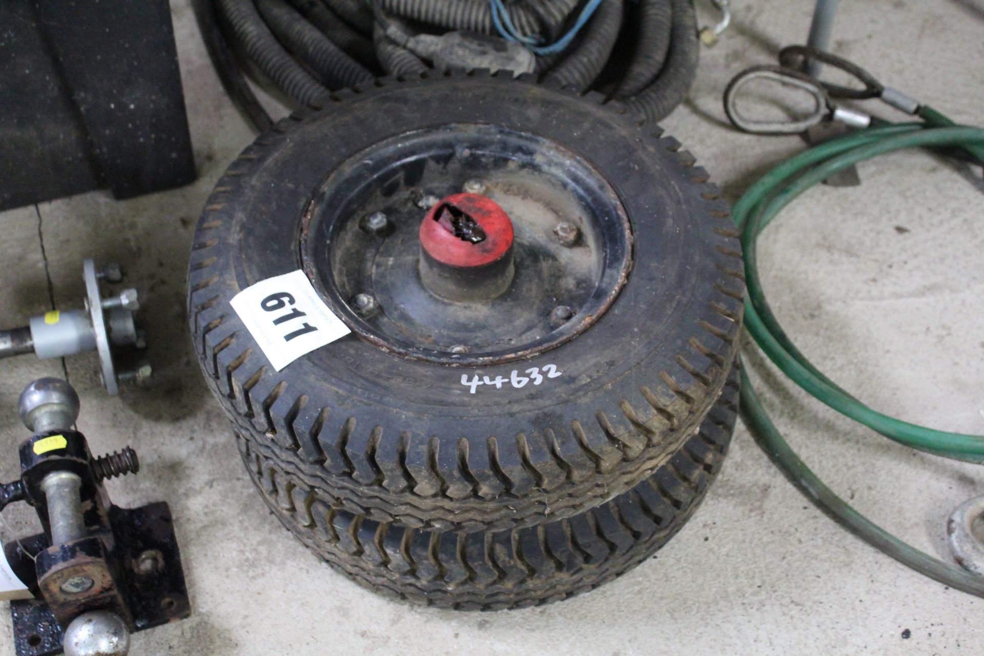 Pair of 4.50-9 industrial heavy-duty wheels and tyres.