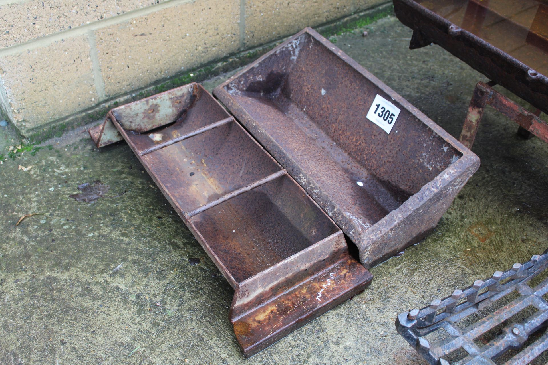 Cast iron trough and another.
