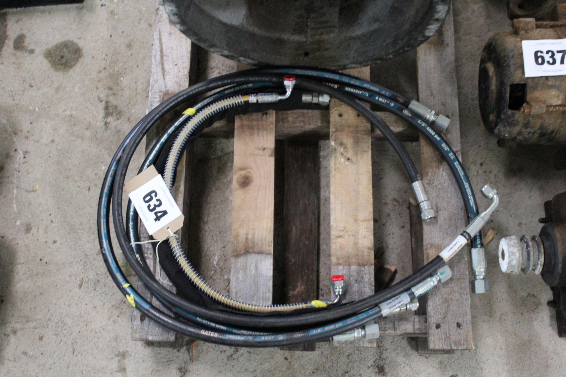 Various hydraulic hoses.