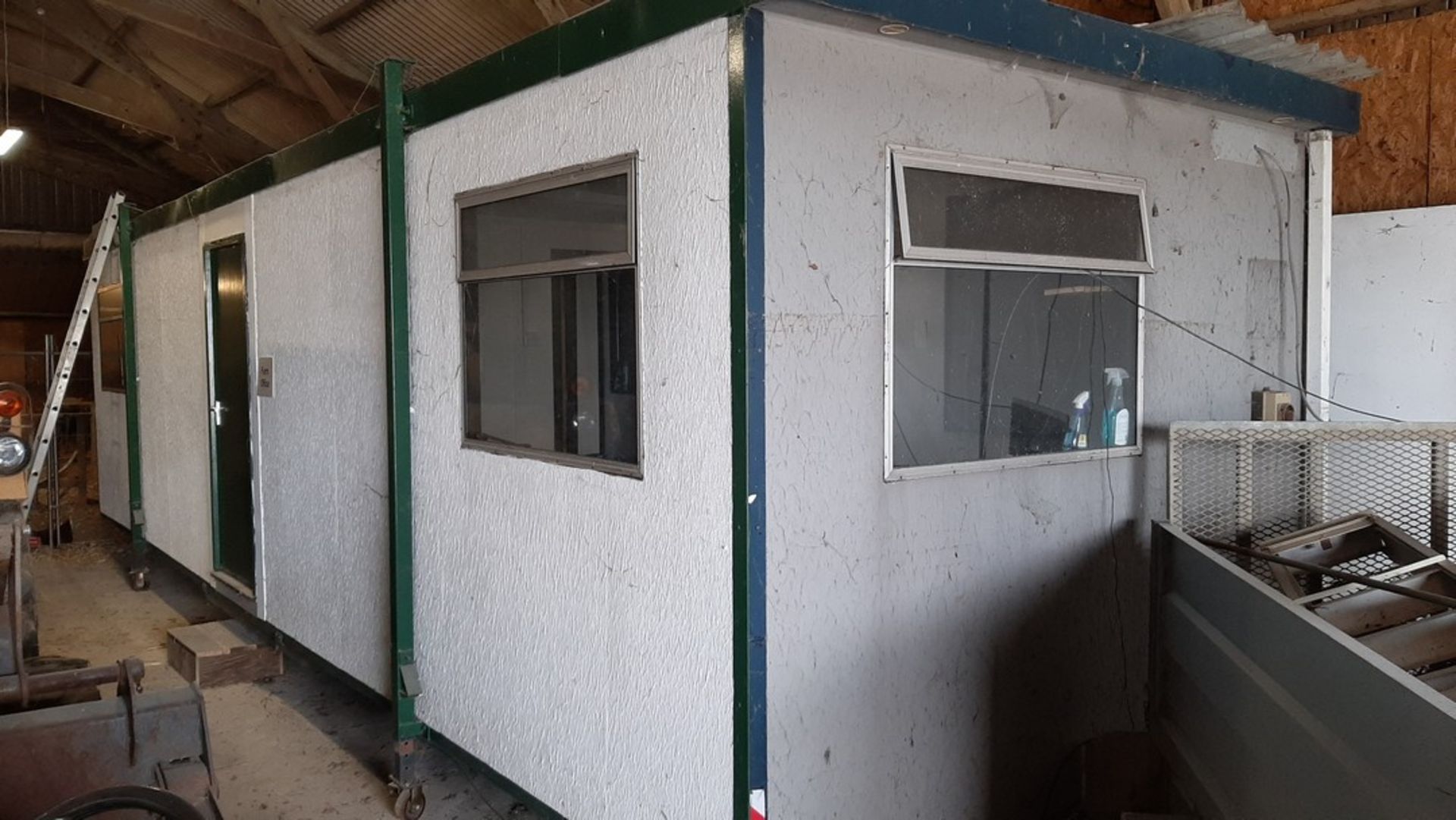 10ft x 32ft jack leg cabin. With two 10ftx 14ft rooms and hall. Used as office inside building.