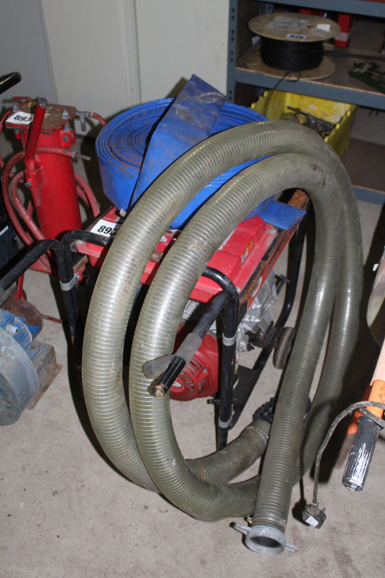 9HP petrol water pump and hoses.