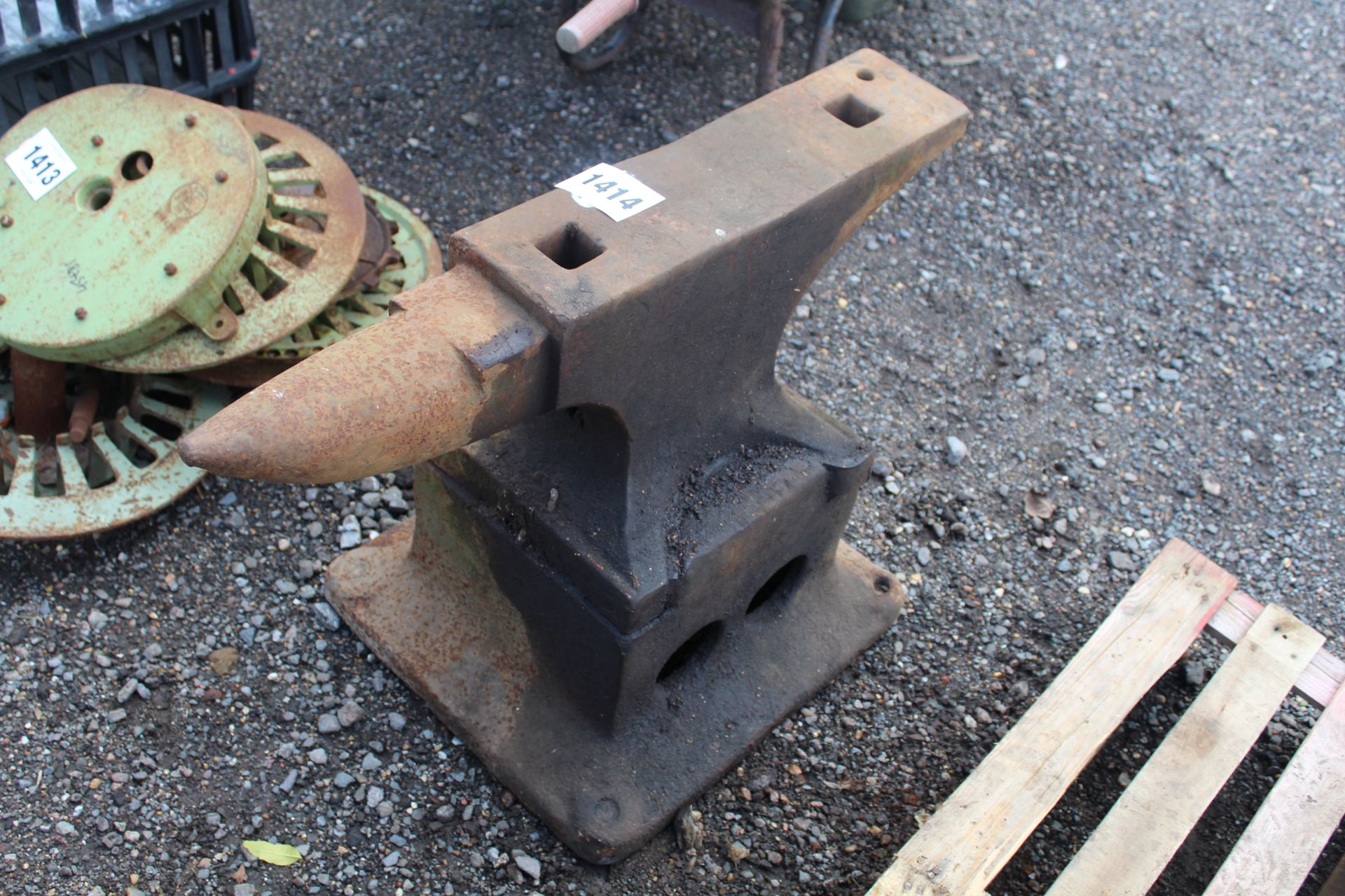 Large anvil on a stand.