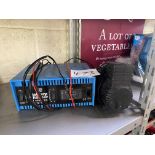 ** UPDATED DESCRIPTION ** Battery charger and a small compressor.